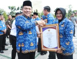 Bupati Siak Terima Penghargaan UHC di Tengah Ujian Berat Keluarga