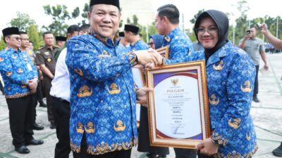 Bupati Siak Terima Penghargaan UHC di Tengah Ujian Berat Keluarga